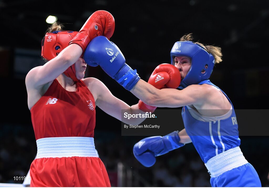 20 June 2015; Michaela Walsh, Ireland, left, exchanges punches with Elena Saveleva, Russia, during their Women's Boxing Bantam 54kg Round of 16 bout. 2015 European Games, Crystal Hall, Baku, Azerbaijan. Picture credit: Stephen McCarthy / SPORTSFILE