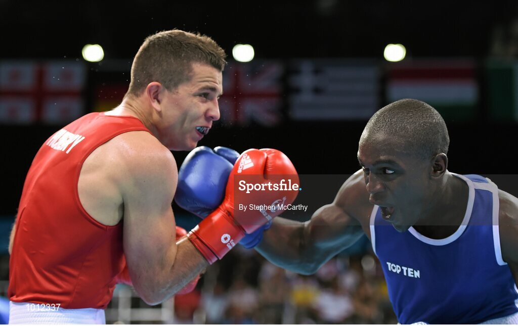20 June 2015; Souleymane Cissokho, France, right, exchanges punches with Balazs Bacskai, Hungary, during their Men's Boxing Welter 69kg Round of 16 bout. 2015 European Games, Crystal Hall, Baku, Azerbaijan. Picture credit: Stephen McCarthy / SPORTSFILE