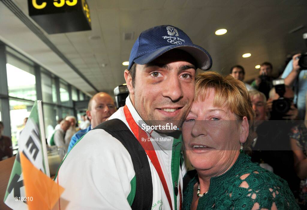 26 August 2008; Silver medallist Kenny Egan pictured with his mother Maura after arriving at Dublin Airport with the Irish Olympic Team, Dublin. Picture credit: David Maher / SPORTSFILE