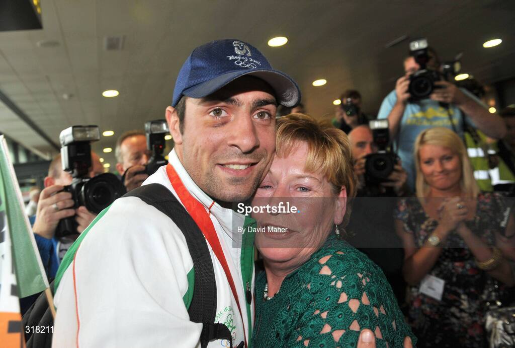 26 August 2008; Silver medallist Kenny Egan pictured with his mother Maura after arriving at Dublin Airport with the Irish Olympic Team, Dublin. Picture credit: David Maher / SPORTSFILE