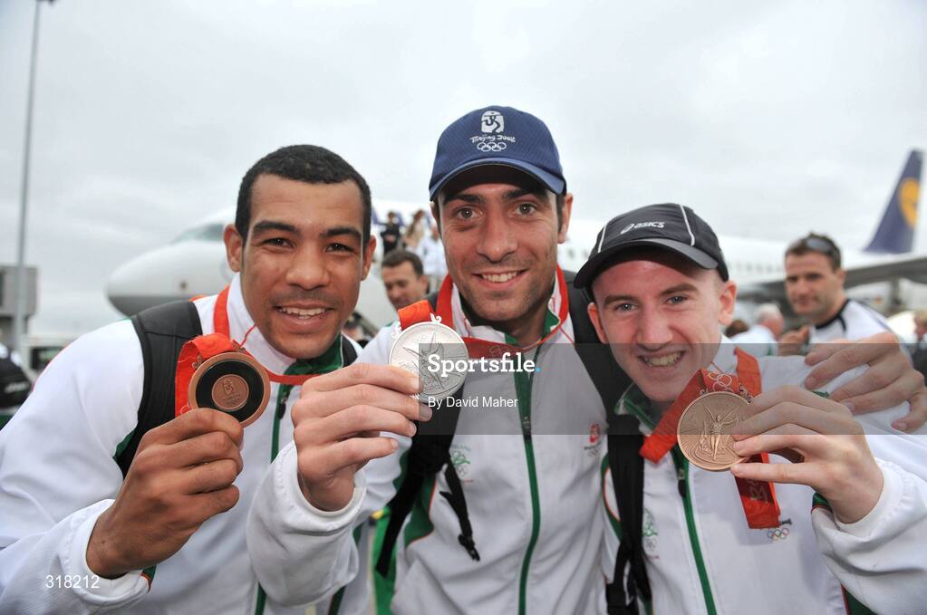 26 August 2008; The Irish Olympic Team, including silver medallist Kenny Egan, bronze medallist Darren Sutherland, and bronze medallist Paddy Barnes, arrive at Dublin Airport, Dublin. Picture credit: David Maher / SPORTSFILE