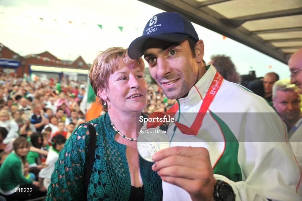 26 August 2008; Olympic silver medallist Kenny Egan and his mother Maura are greeted by supporters upon their arrival at Clondalkin, Co. Dublin. Picture credit: David Maher / SPORTSFILE