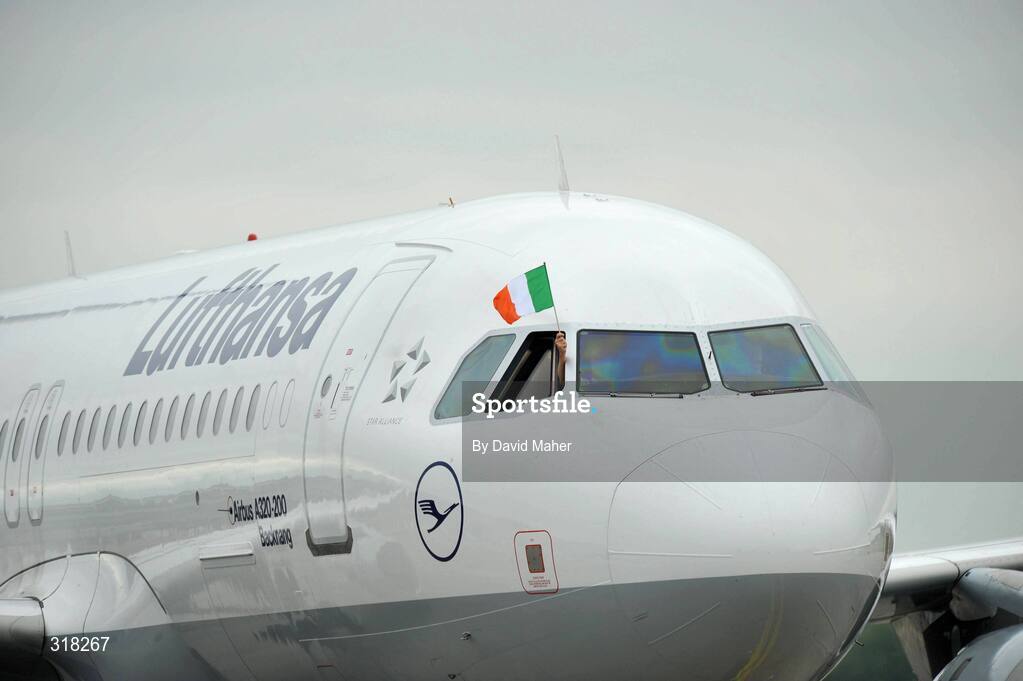 26 August 2008; The Irish flag is flown on the plane carrying the Irish Olympic Team, including silver medallist Kenny Egan and bronze medallists Darren Sutherland and Paddy Barnes, as it arrives at Dublin Airport, Dublin. Picture credit: David Maher / SPORTSFILE