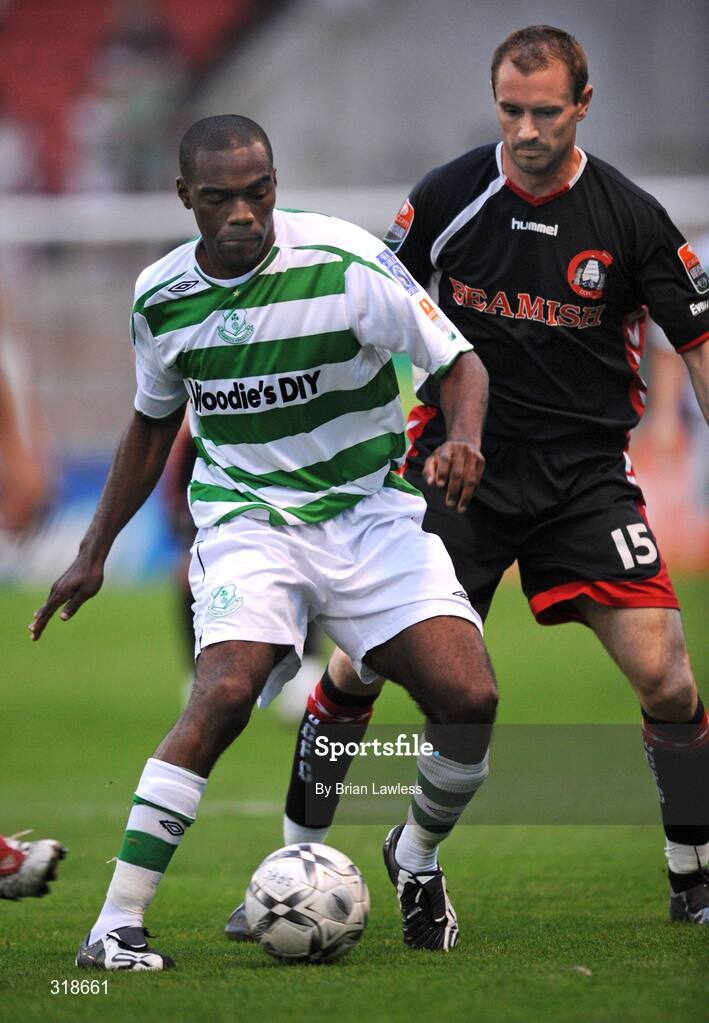 29 August 2008; Joseph Ndo, Shamrock Rovers, in action against Colin Healy, Cork City. eircom League of Ireland Premier Division, Shamrock Rovers v Cork City, Tolka Park, Dublin. Picture credit: Brian Lawless / SPORTSFILE