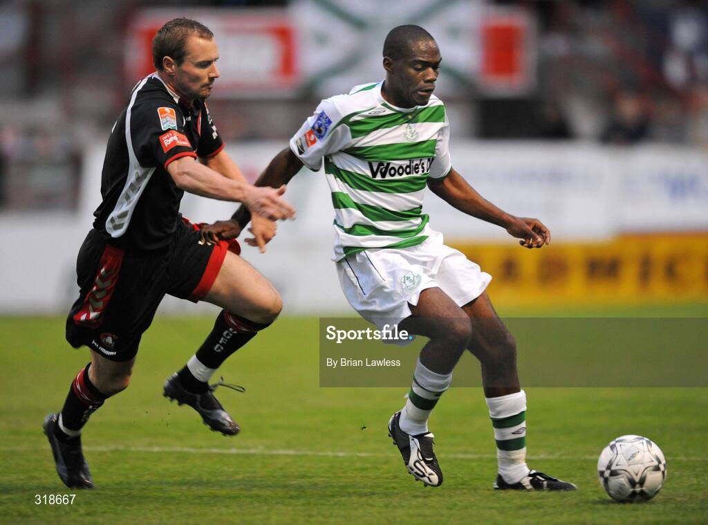 29 August 2008; Joseph Ndo, Shamrock Rovers, in action against Colin Healy, Cork City. eircom League of Ireland Premier Division, Shamrock Rovers v Cork City, Tolka Park, Dublin. Picture credit: Brian Lawless / SPORTSFILE