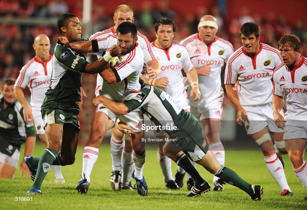 29 August 2008; Rua Tipoki, Munster, is tackled by Delon Armitage, left, and Paul Hodgson, London Irish. Pre-Season Friendly - Munster v London Irish, Musgrave Park, Cork. Picture credit: Brendan Moran / SPORTSFILE