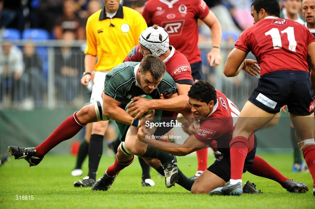 30 August 2008; Cian Healy, Leinster, is tackled by Adam Byrnes and Ben Gollings, Queensland Reds. Pre-season friendly, Queensland Reds v Leinster, Donnybrook Stadium, Donnybrook, Dublin. Picture credit: Brendan Moran / SPORTSFILE