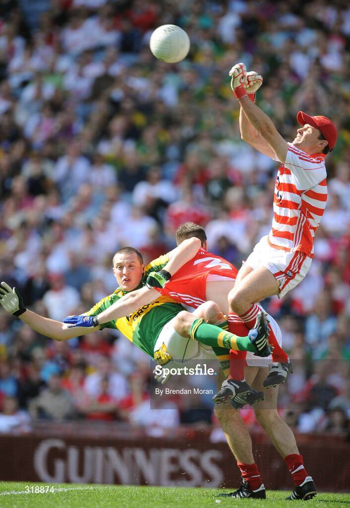 31 August 2008; Cork goalkeeper Alan Quirke punches the ball clear as Kieran Donaghy, Kerry, is tackled by Derek Kavanagh, Cork. GAA Football All-Ireland Senior Championship Semi-Final Replay, Kerry v Cork, Croke Park, Dublin. Picture credit: Brendan Moran / SPORTSFILE