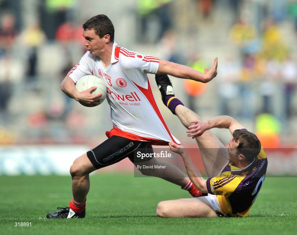 31 August 2008; Tommy McGuigan, Tyrone, in action against David Walsh, Wexford. GAA Football All-Ireland Senior Championship Semi-Final, Tyrone v Wexford, Croke Park, Dublin. Picture credit: David Maher / SPORTSFILE