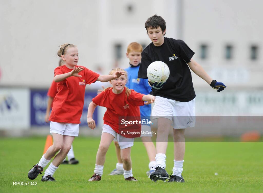 26 August 2008; Now in its sixth year, the Dublin Docklands Festival of Hurling and Gaelic Football helps young people from the Docklands develop their hurling and football skills. Today they had the experience of learning hurling and football skills from their sporting heroes Niall Quinn, Nicky English and Paul Casey during this year’s Docklands Festival of Hurling and Gaelic Football at Parnell Park. Pictured taking part is Gerard McGuinness, age 14, Jessica Hopkins, age 9, left, and Erica O'Neill, age 5. Parnell Park, Dublin. Picture credit: Stephen McCarthy / SPORTSFILE