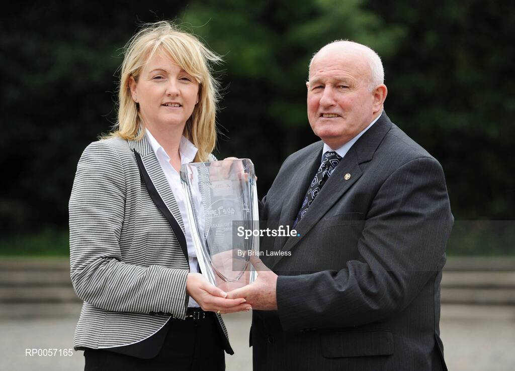 28 August 2008; Down Gaelic Football legend, Paddy Doherty, was today inducted into the MBNA Kick Fada Hall of Fame. Paddy is presented with his award by Suzanne Holmes, Communications Manager with MBNA. Over 20 stars of Gaelic Football will compete for the prestigious All-Ireland title at the 8th annual MBNA Kick Fada competition, which will take place on Saturday, September 13th at Bray Emmets GAA Club, Bray, Co. Wicklow. Iveagh Gardens, Dublin. Picture credit: Brian Lawless / SPORTSFILE