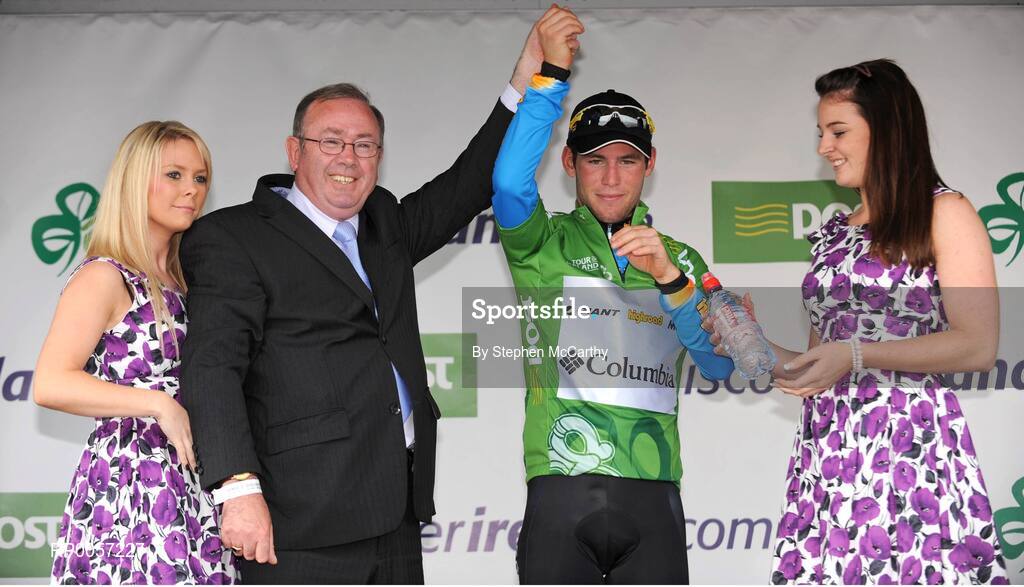 29 August 2008; Mark Cavendish, Team Columbia, after being presented with the An Post sponsored green jersey by Gerry Kearney, An Post Retail Operations Manager Western Region. 2008 Tour of Ireland - Stage 3, Ballinrobe - Galway. Picture credit: Stephen McCarthy / SPORTSFILE