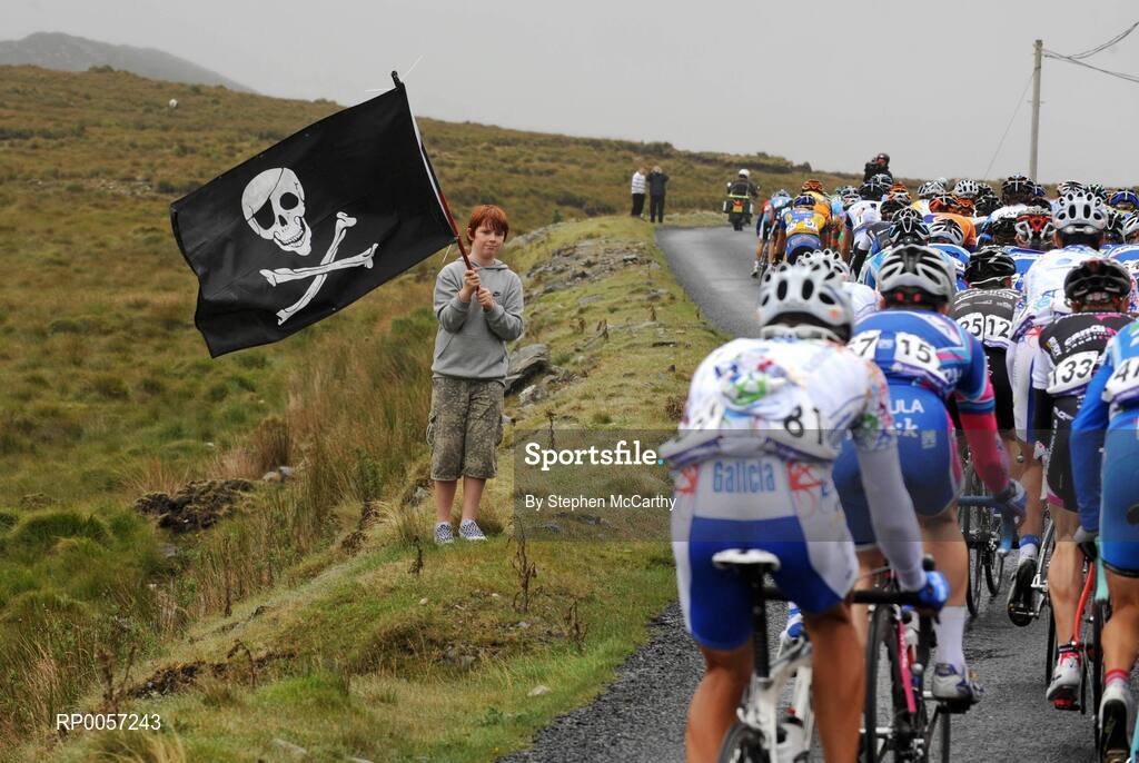29 August 2008; A young fan waves a flag as the riders approach the summit of Maumturk, Co. Galway. 2008 Tour of Ireland - Stage 3, Ballinrobe - Galway. Picture credit: Stephen McCarthy / SPORTSFILE
