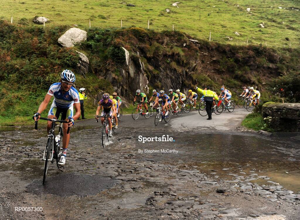 30 August 2008; A general view of the peloton crossing a flooded road at Slea Head, Co. Kerry. 2008 Tour of Ireland - Stage 4, Limerick - Dingle. Picture credit: Stephen McCarthy / SPORTSFILE