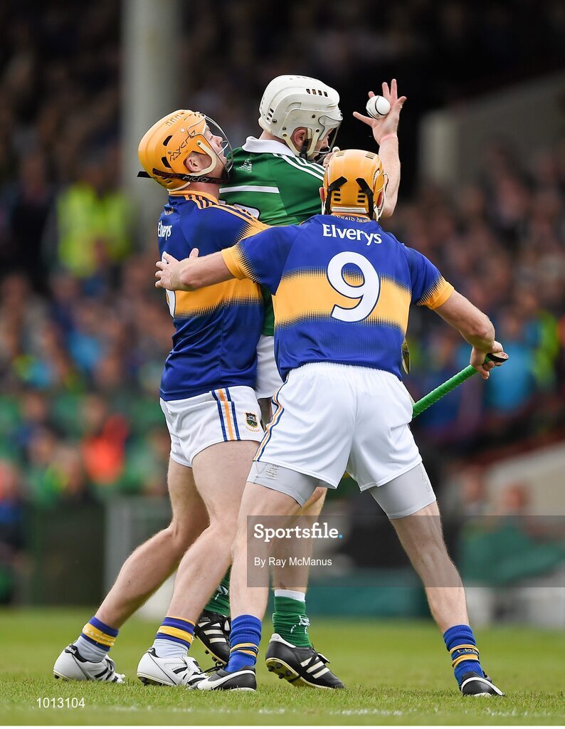 21 June 2015; Cian Lynch, Limerick, in action against Padraic Maher, 6, and Shane McGrath, Tipperary. Munster GAA Hurling Senior Championship, Semi-Final, Limerick v Tipperary, Gaelic Grounds, Limerick. Picture credit: Ray McManus / SPORTSFILE