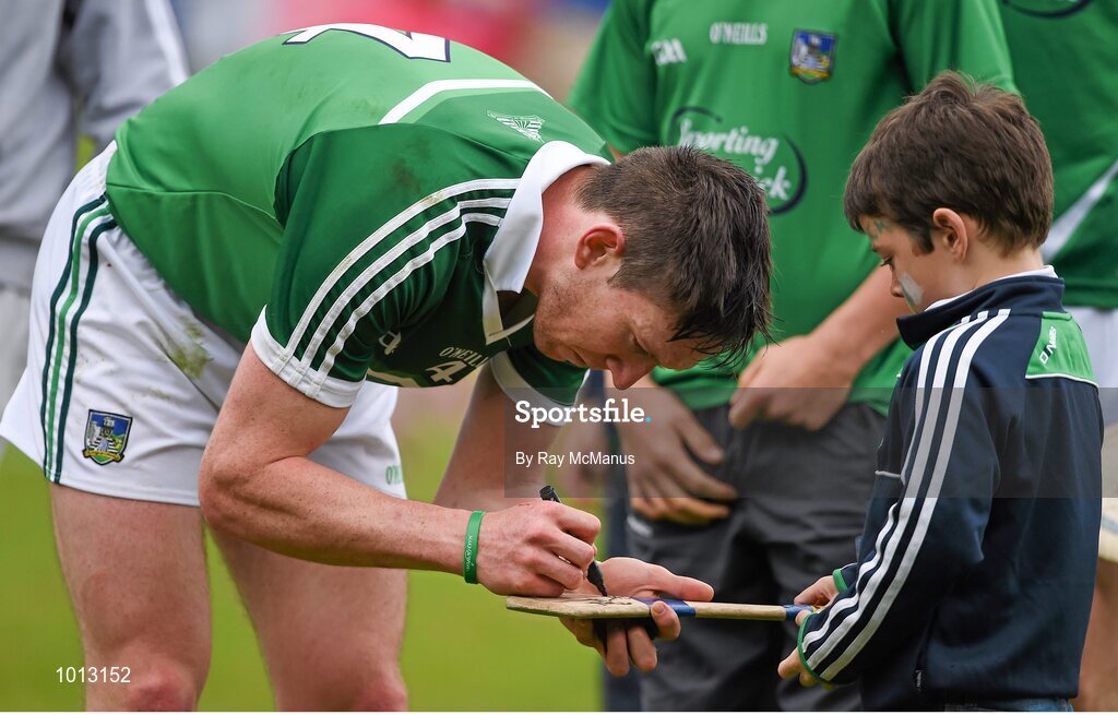 21 June 2015; Limerick's Seamus Highey signs a hurl for a supporter after the game. Munster GAA Hurling Senior Championship, Semi-Final, Limerick v Tipperary, Gaelic Grounds, Limerick. Picture credit: Ray McManus / SPORTSFILE
