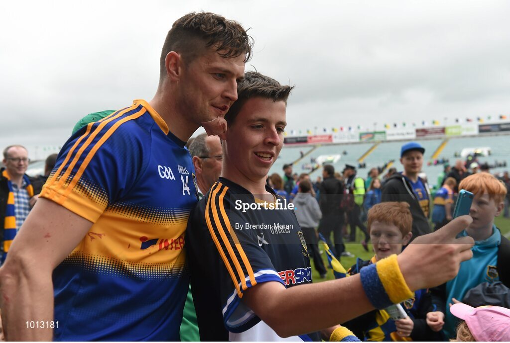 21 June 2015; A Tipperary supporter takes a 'selfie' with Seamus Callanan, Tipperary, after the game. Munster GAA Hurling Senior Championship, Semi-Final, Limerick v Tipperary, Gaelic Grounds, Limerick. Picture credit: Brendan Moran / SPORTSFILE