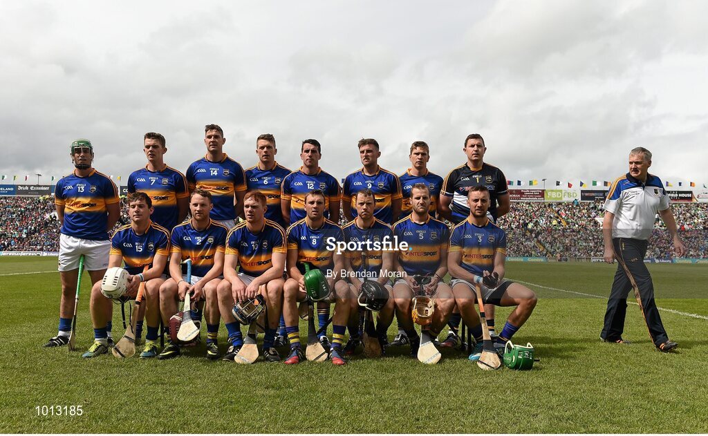 21 June 2015; Tipperary manager Eamon O'Shea walks away as his team stand for a team photograph before the game. Munster GAA Hurling Senior Championship, Semi-Final, Limerick v Tipperary, Gaelic Grounds, Limerick. Picture credit: Brendan Moran / SPORTSFILE