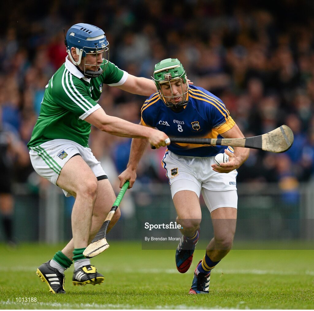 21 June 2015; James Woodlock, Tipperary, is tackled by Richie McCarthy, Limerick. Munster GAA Hurling Senior Championship, Semi-Final, Limerick v Tipperary, Gaelic Grounds, Limerick. Picture credit: Brendan Moran / SPORTSFILE