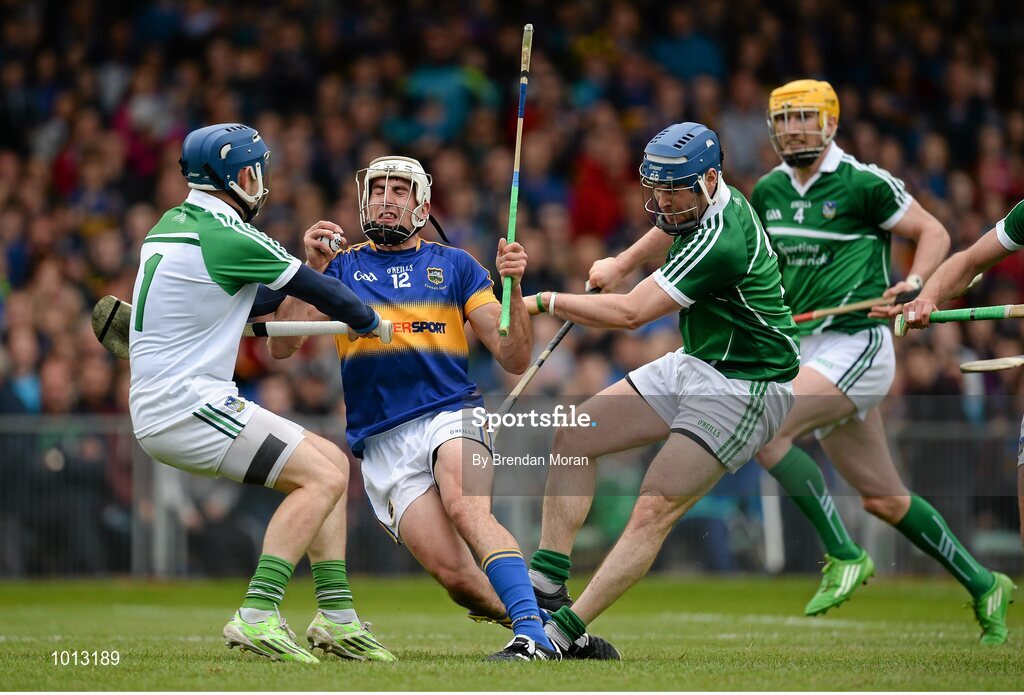 21 June 2015; Patrick Maher, Tipperary, is tackled by Barry Hennessy, left, and Richie McCarthy, Limerick. Munster GAA Hurling Senior Championship, Semi-Final, Limerick v Tipperary, Gaelic Grounds, Limerick. Picture credit: Brendan Moran / SPORTSFILE