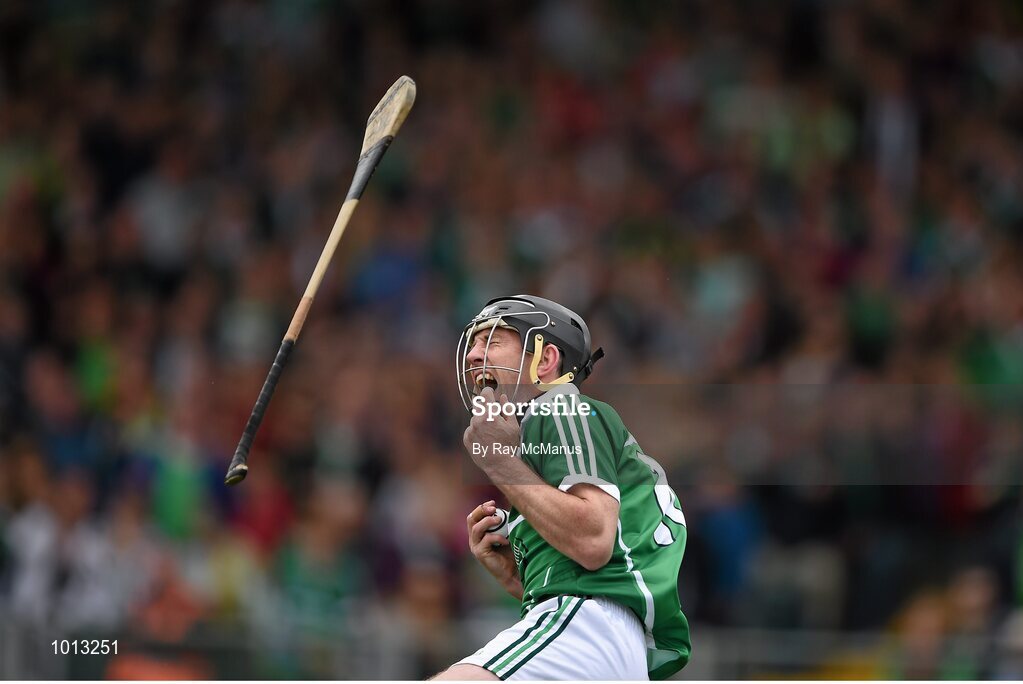 21 June 2015; Limerick captain Donal O'Grady after getting clipped on the knuckles as he made his way towards goal. Munster GAA Hurling Senior Championship, Semi-Final, Limerick v Tipperary, Gaelic Grounds, Limerick. Picture credit: Ray McManus / SPORTSFILE