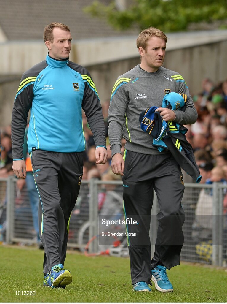 21 June 2015; Tipperary players Lar Corbett, left, and Noel McGrath arrive to take their seats in the dugout before the game. Munster GAA Hurling Senior Championship, Semi-Final, Limerick v Tipperary, Gaelic Grounds, Limerick. Picture credit: Brendan Moran / SPORTSFILE