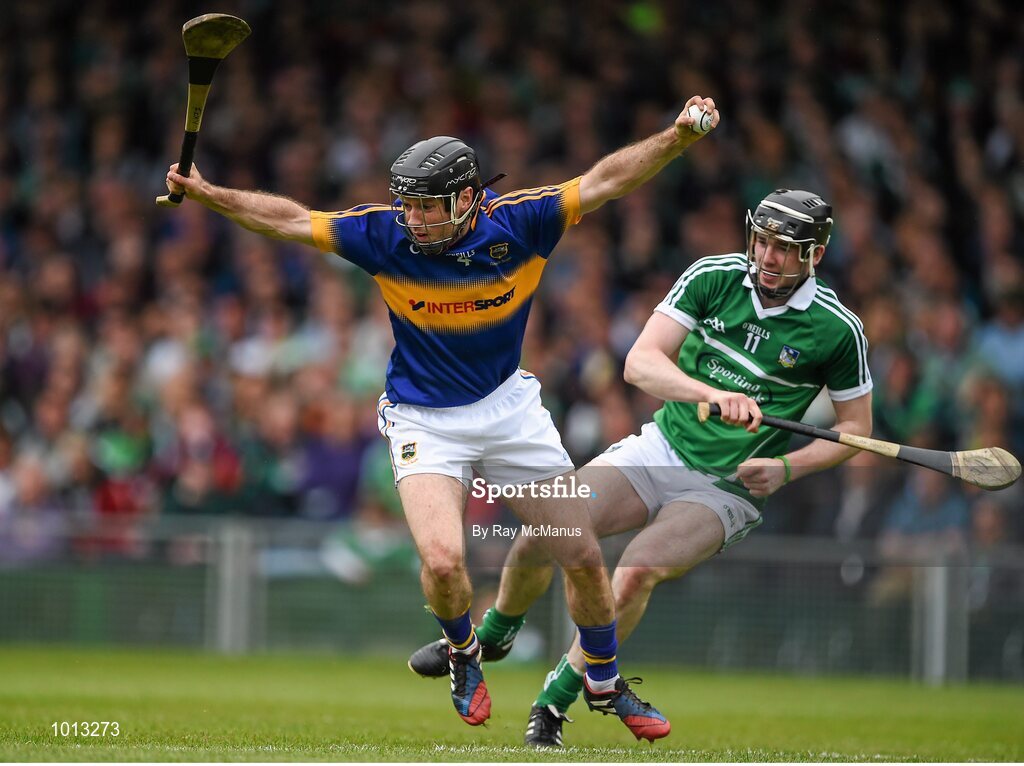 21 June 2015; Conor O'Brien, Tipperary, in action against Declan Hannon, Limerick. Munster GAA Hurling Senior Championship, Semi-Final, Limerick v Tipperary, Gaelic Grounds, Limerick. Picture credit: Ray McManus / SPORTSFILE