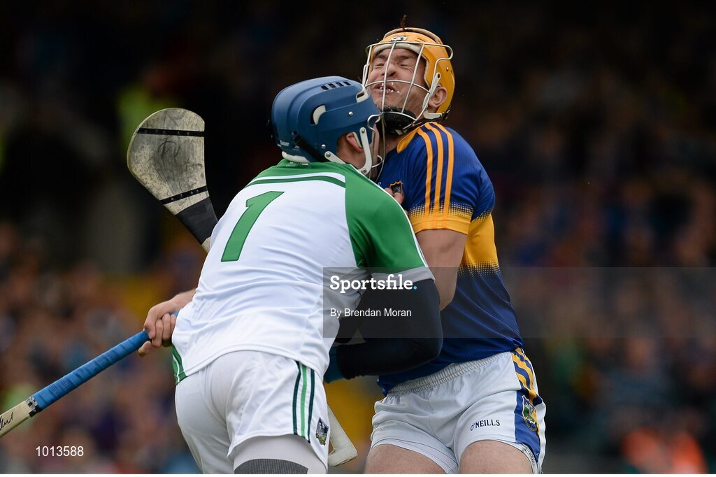21 June 2015; Seamus Callanan, Tipperary, clashes with Limerick goalkeeper Barry Hennessy, in which Callanan lost 3 teeth and left the pitch for a blood injury before returning late in the game. Munster GAA Hurling Senior Championship, Semi-Final, Limerick v Tipperary, Gaelic Grounds, Limerick. Picture credit: Brendan Moran / SPORTSFILE