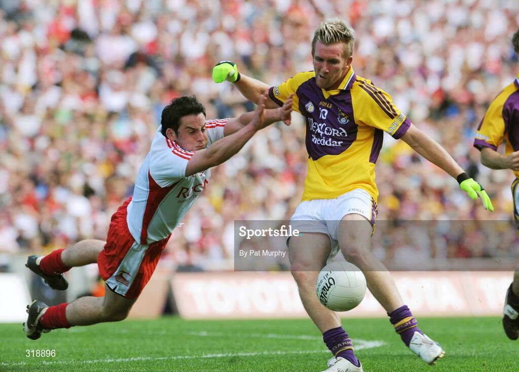 31 August 2008; P.J. Banville, Wexford, in action against Davy Harte, Tyrone. GAA Football All-Ireland Senior Championship Semi-Final, Tyrone v Wexford, Croke Park, Dublin. Picture credit: Pat Murphy / SPORTSFILE