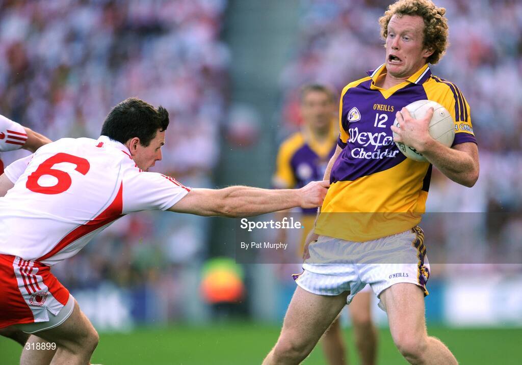 31 August 2008; Collie Byrne, Wexford, in action against Conor Gormley, Tyrone. GAA Football All-Ireland Senior Championship Semi-Final, Tyrone v Wexford, Croke Park, Dublin. Picture credit: Pat Murphy / SPORTSFILE