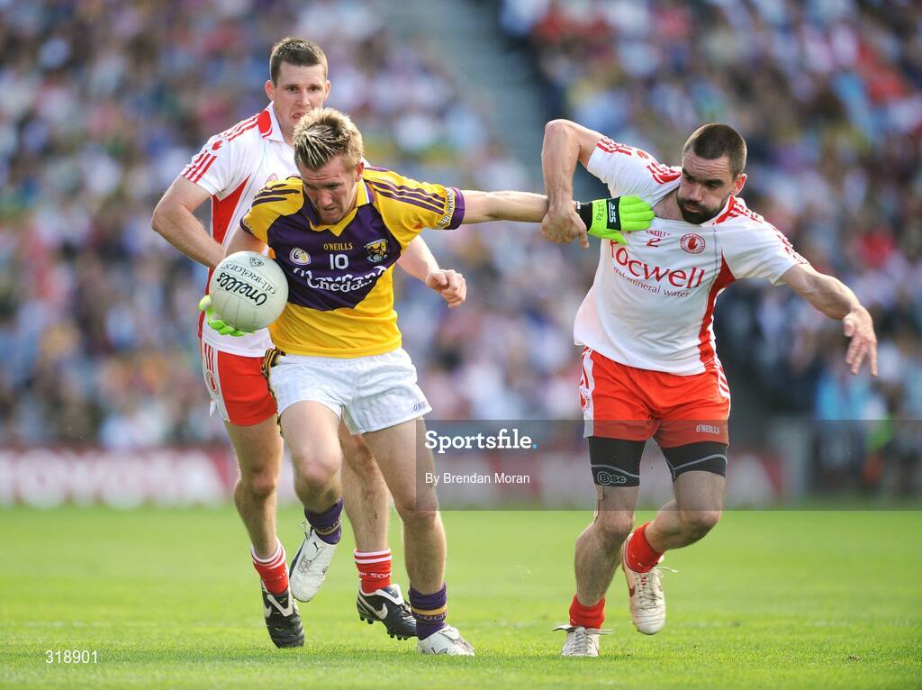 31 August 2008; PJ Banville, Wexford, in action against Colin Holmes, left, and Ryan McManamin, Tyrone. GAA Football All-Ireland Senior Championship Semi-Final, Tyrone v Wexford, Croke Park, Dublin. Picture credit: Brendan Moran / SPORTSFILE