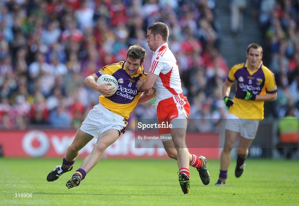 31 August 2008; Redmond Barry, Wexford, in action against Philip Jordan, Tyrone. GAA Football All-Ireland Senior Championship Semi-Final, Tyrone v Wexford, Croke Park, Dublin. Picture credit: Brendan Moran / SPORTSFILE