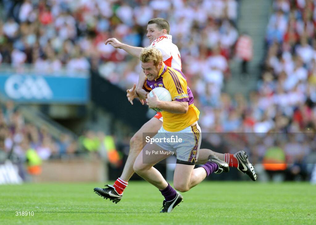 31 August 2008; Eric Bradley, Wexford, in action against Colin Holmes, Tyrone. GAA Football All-Ireland Senior Championship Semi-Final, Tyrone v Wexford, Croke Park, Dublin. Picture credit: Pat Murphy / SPORTSFILE