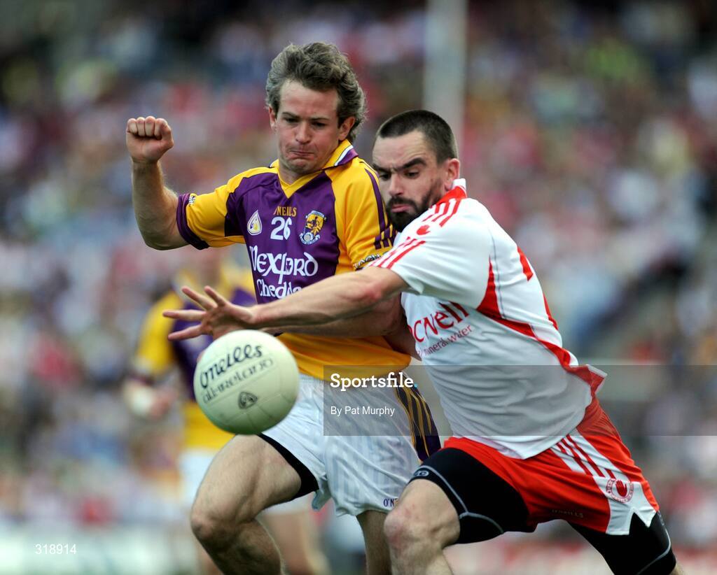 31 August 2008; Ciaran Deely, Tyrone, in action against Ryan McMenamin, Wexford. GAA Football All-Ireland Senior Championship Semi-Final, Tyrone v Wexford, Croke Park, Dublin. Picture credit: Pat Murphy / SPORTSFILE