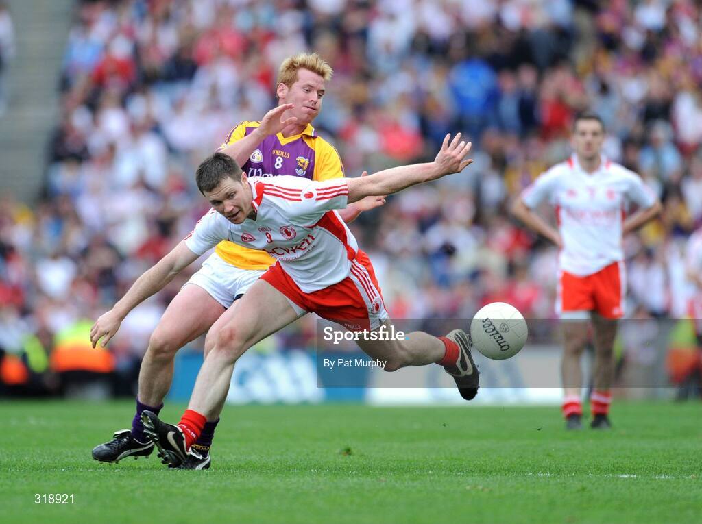 31 August 2008; Enda McGinley, Tyrone, in action against Eric Bradley, Wexford. GAA Football All-Ireland Senior Championship Semi-Final, Tyrone v Wexford, Croke Park, Dublin. Picture credit: Pat Murphy / SPORTSFILE