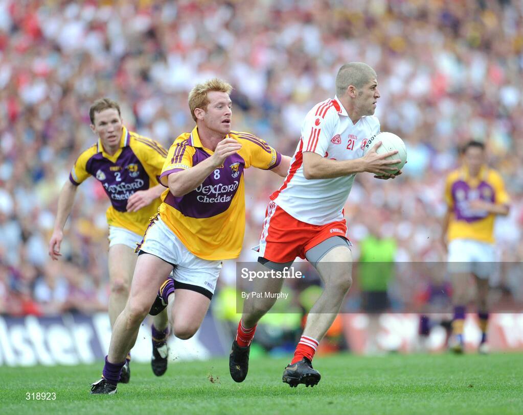 31 August 2008; Kevin Hughes, Tyrone, in action against Eric Bradley, Wexford. GAA Football All-Ireland Senior Championship Semi-Final, Tyrone v Wexford, Croke Park, Dublin. Picture credit: Pat Murphy / SPORTSFILE