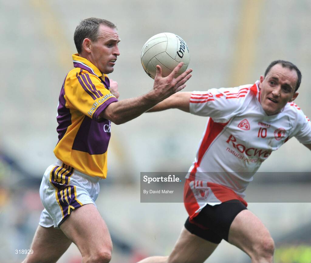 31 August 2008; Colm Morris, Wexford, in action against Brian Dooher, Tyrone. GAA Football All-Ireland Senior Championship Semi-Final, Tyrone v Wexford, Croke Park, Dublin. Picture credit: David Maher / SPORTSFILE