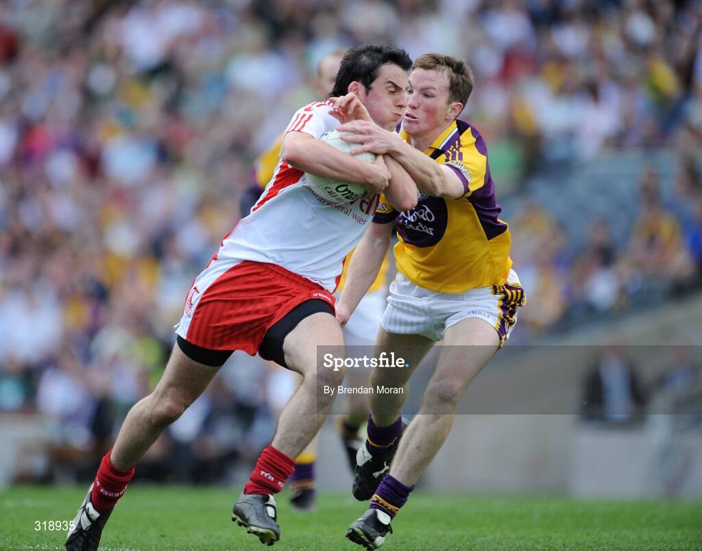 31 August 2008; Davy Harte, Tyrone, in action against David Walsh, Wexford. GAA Football All-Ireland Senior Championship Semi-Final, Tyrone v Wexford, Croke Park, Dublin. Picture credit: Brendan Moran / SPORTSFILE