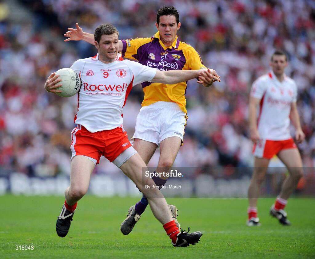 31 August 2008; Enda McGinley, Tyrone, in action against Shane Roche, Wexford. GAA Football All-Ireland Senior Championship Semi-Final, Tyrone v Wexford, Croke Park, Dublin. Picture credit: Brendan Moran / SPORTSFILE