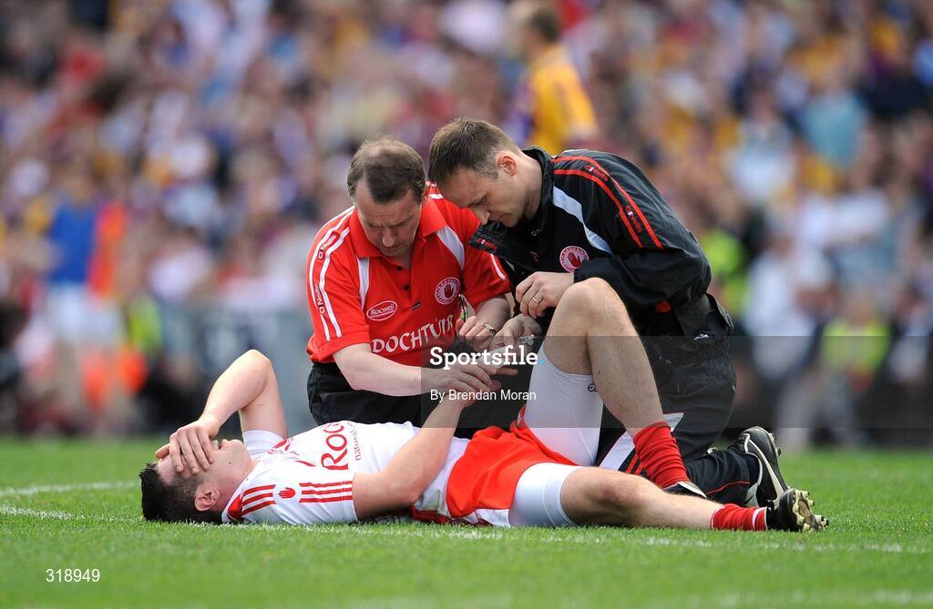 31 August 2008; Sean Cavanagh, Tyrone, is attended to by medical staff before leaving the pitch. GAA Football All-Ireland Senior Championship Semi-Final, Tyrone v Wexford, Croke Park, Dublin. Picture credit: Brendan Moran / SPORTSFILE