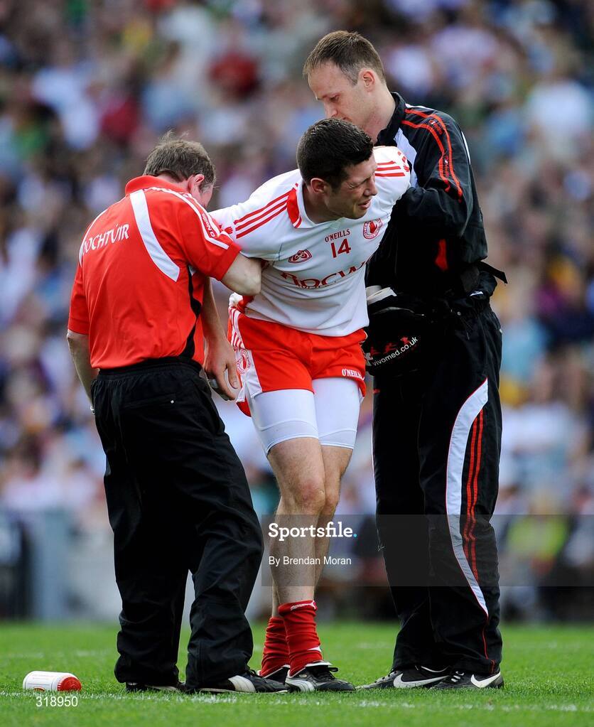 31 August 2008; Sean Cavanagh, Tyrone, is attended to by medical staff before leaving the pitch. GAA Football All-Ireland Senior Championship Semi-Final, Tyrone v Wexford, Croke Park, Dublin. Picture credit: Brendan Moran / SPORTSFILE