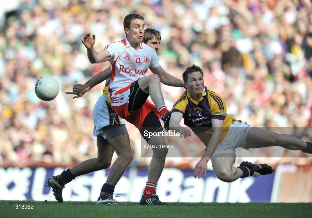 31 August 2008; Tommy McGuigan, Tyrone, in action against David Walsh, right, and Brian Malone, Wexford. GAA Football All-Ireland Senior Championship Semi-Final, Tyrone v Wexford, Croke Park, Dublin. Picture credit: David Maher / SPORTSFILE