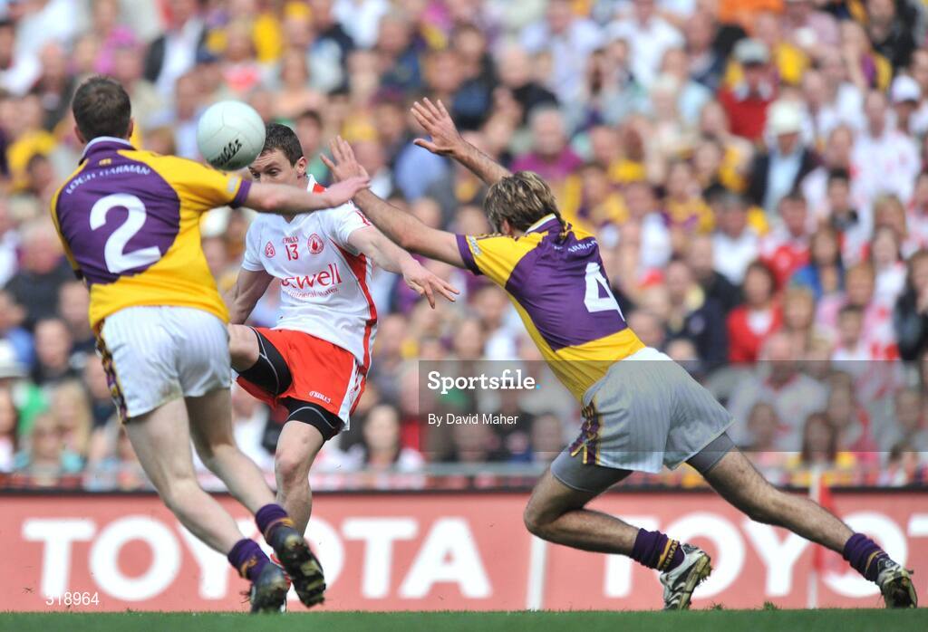 31 August 2008; Tommy McGuigan, Tyrone, in action against David Walsh, 2, and Giaran Gourley, Wexford. GAA Football All-Ireland Senior Championship Semi-Final, Tyrone v Wexford, Croke Park, Dublin. Picture credit: David Maher / SPORTSFILE