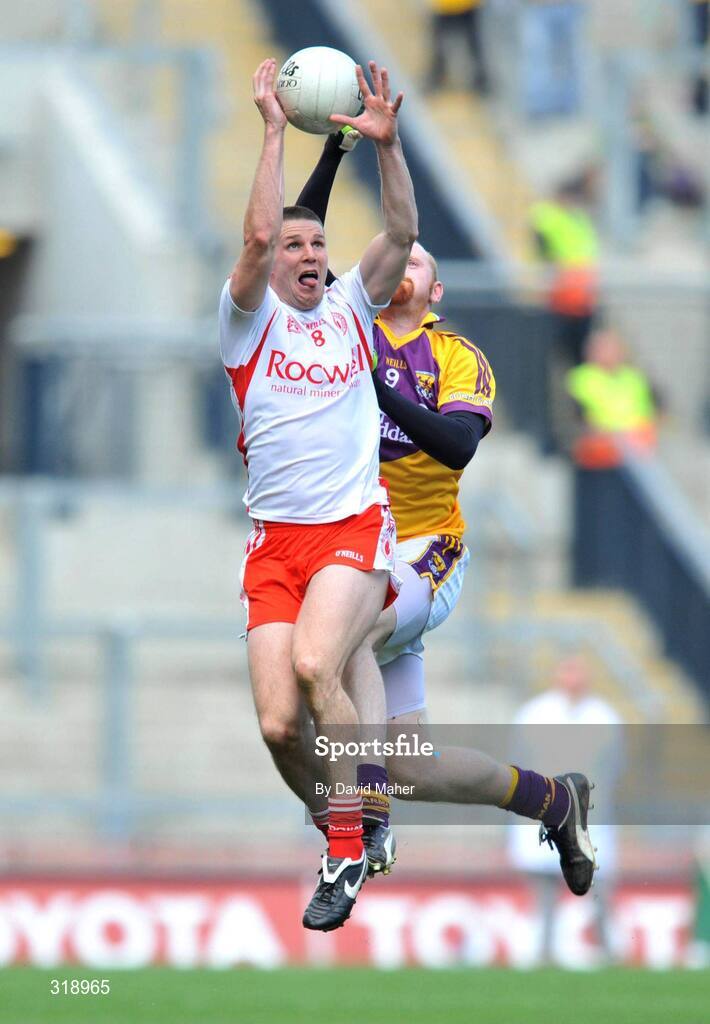 31 August 2008; Colin Holmes, Tyrone, in action against Brendan Doyle, Wexford. GAA Football All-Ireland Senior Championship Semi-Final, Tyrone v Wexford, Croke Park, Dublin. Picture credit: David Maher / SPORTSFILE