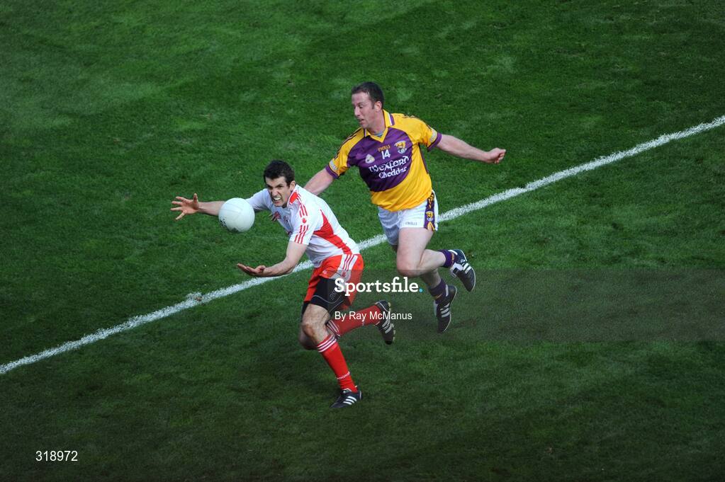 31 August 2008; Justin Mcmahon, Tyrone, in action against Paddy Colfer, Wexford. GAA Football All-Ireland Senior Championship Semi-Final, Tyrone v Wexford, Croke Park, Dublin. Picture credit: Ray McManus / SPORTSFILE