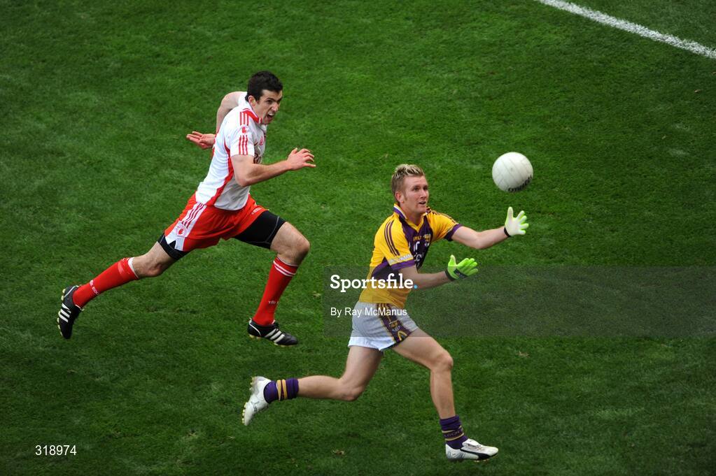 31 August 2008; P.J. Banville, Wexford, in action against Justin McMahon, Tyrone. GAA Football All-Ireland Senior Championship Semi-Final, Tyrone v Wexford, Croke Park, Dublin. Picture credit: Ray McManus / SPORTSFILE