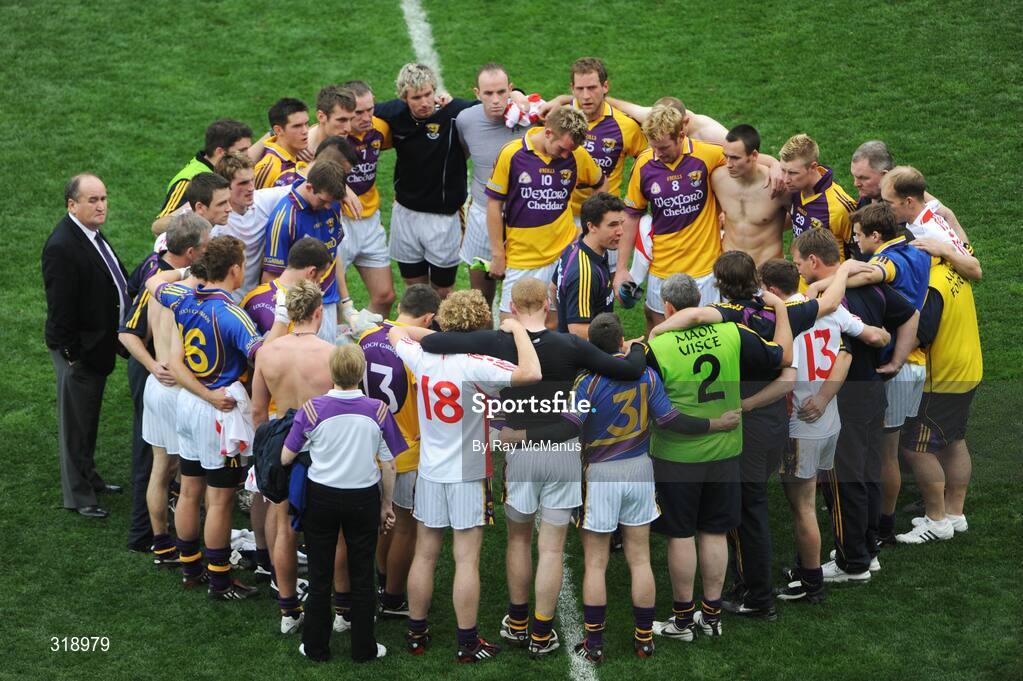 31 August 2008; Wexford County Chairman Ger Doyle and the team members listen to manager Jason Ryan as he addresses them after the game. GAA Football All-Ireland Senior Championship Semi-Final, Tyrone v Wexford, Croke Park, Dublin. Picture credit: Ray McManus / SPORTSFILE