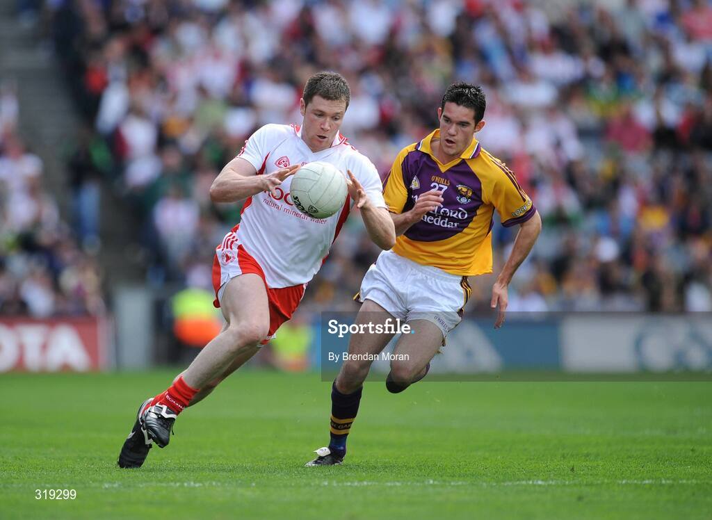 31 August 2008; Enda McGinley, Tyrone, in action against Shane Roche, Wexford. GAA Football All-Ireland Senior Championship Semi-Final, Tyrone v Wexford, Croke Park, Dublin. Picture credit: Brendan Moran / SPORTSFILE