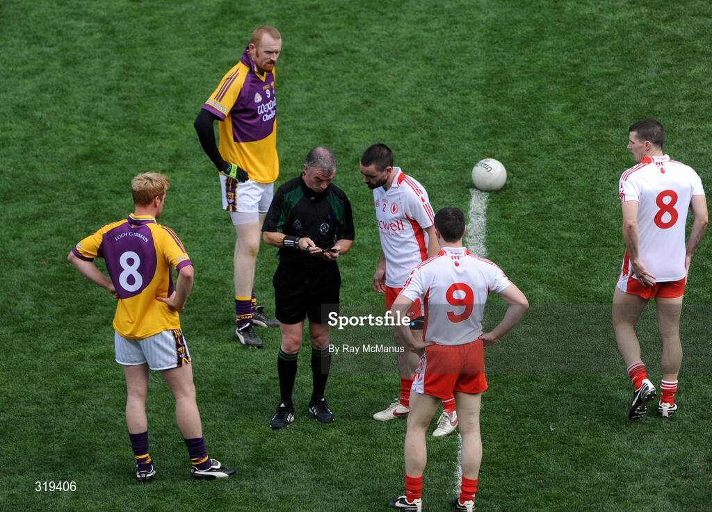 31 August 2008; Ryan McMenamin, Tyrone, checks with referee Pat McEnaney as to his status in the 'tick' book before the start of the second-half. He had been 'ticked' in the first-half. GAA Football All-Ireland Senior Championship Semi-Final, Tyrone v Wexford, Croke Park, Dublin. Picture credit: Ray McManus / SPORTSFILE