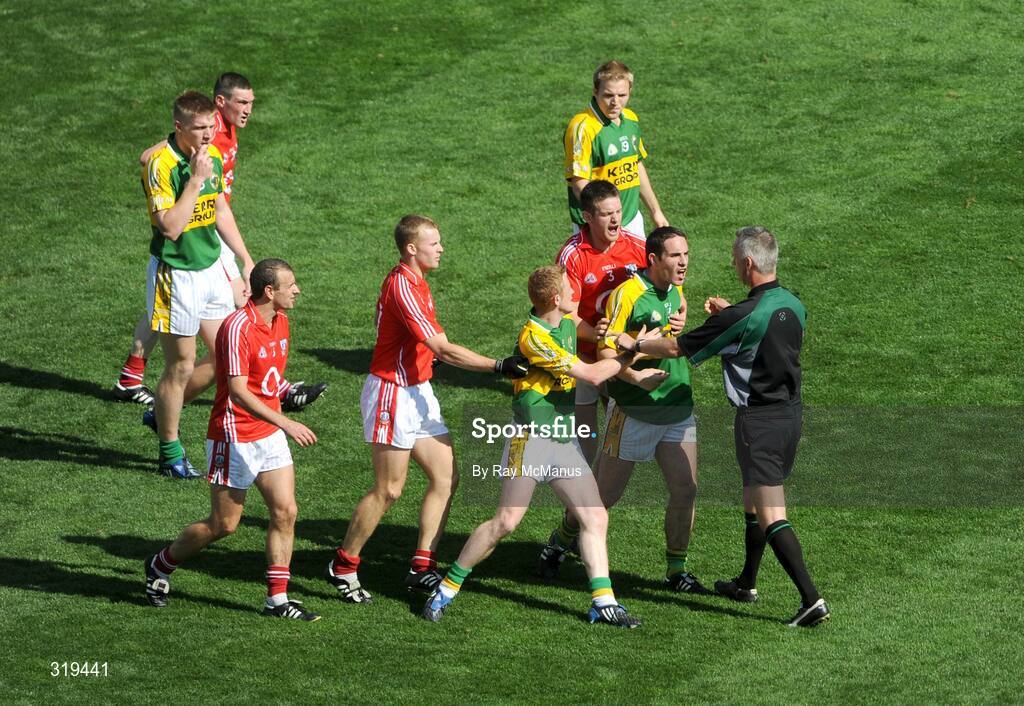 31 August 2008; Declan O'Sullivan, Kerry, is restrained by Cork full-back Derek Kavanagh as he remonstrates with referee Jimmy White. He was later shown a yellow card. GAA Football All-Ireland Senior Championship Semi-Final Replay, Kerry v Cork, Croke Park, Dublin. Picture credit: Ray McManus / SPORTSFILE